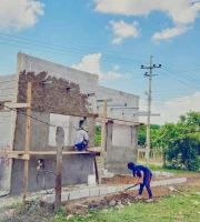 Miniatura de trabajadores participando en el repello es excavación de la obra.