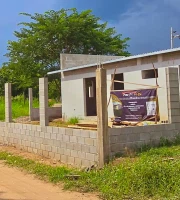 Miniatura de vista de la casa en construcción y rótulo de PlanificaHN.